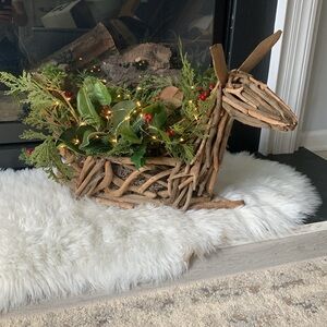 Reindeer driftwood Christmas holidays‎ center piece greenery string lights